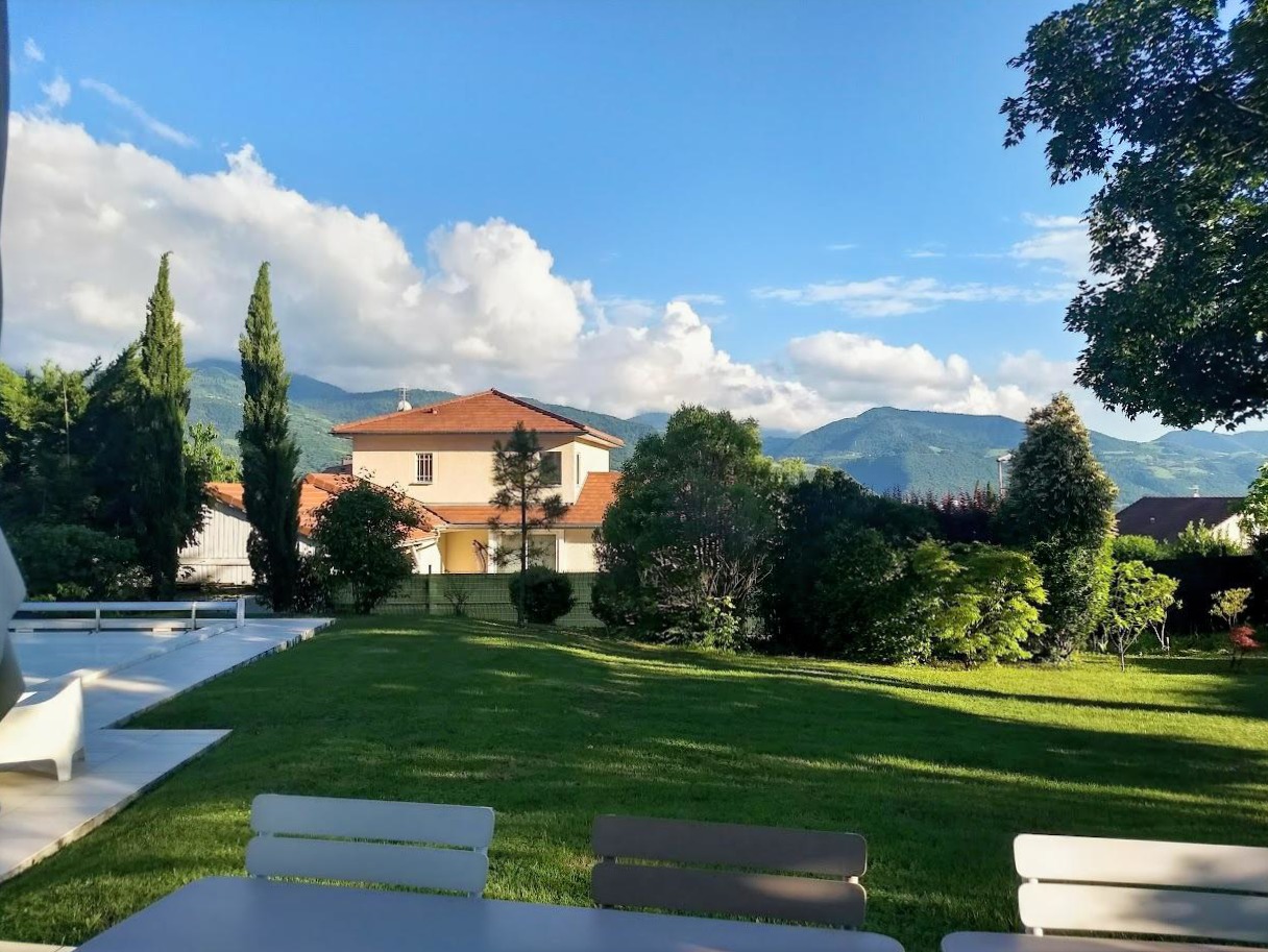 Outdoor café with cheese fondue in Annecy